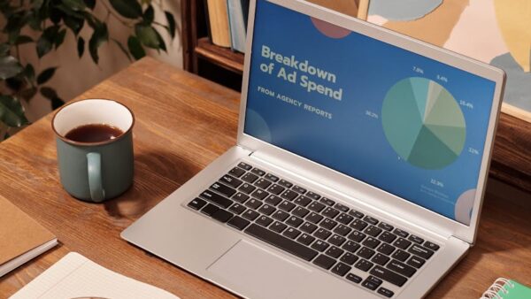 laptop on wooden desk